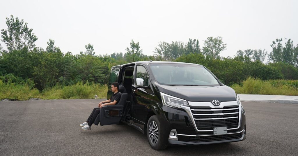 Toyota Granace van with a swivel seat offers enhanced accessibility in a serene outdoor setting.